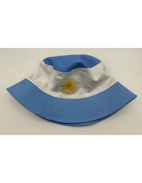 PILUSO BLANCO Y CELESTE CON BORDADO SOL DE MAYO.