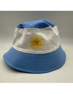 PILUSO BLANCO Y CELESTE CON BORDADO SOL DE MAYO.