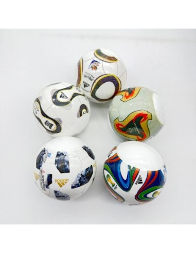 CAPSULA 70MM MUNDIAL CON MINITOY DE GOMA Y TAZO.